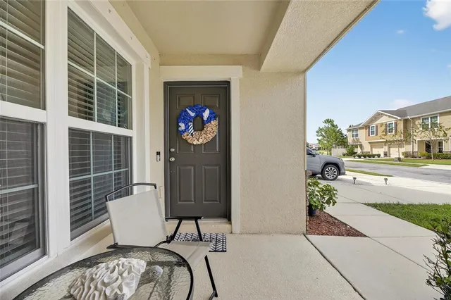 a living room with furniture and a table