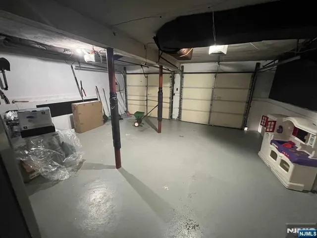 a view of room with window and hardwood floor