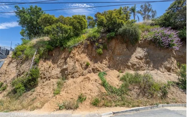 a view of a lake with a yard