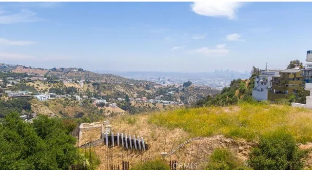 an aerial view of residential building and lake view