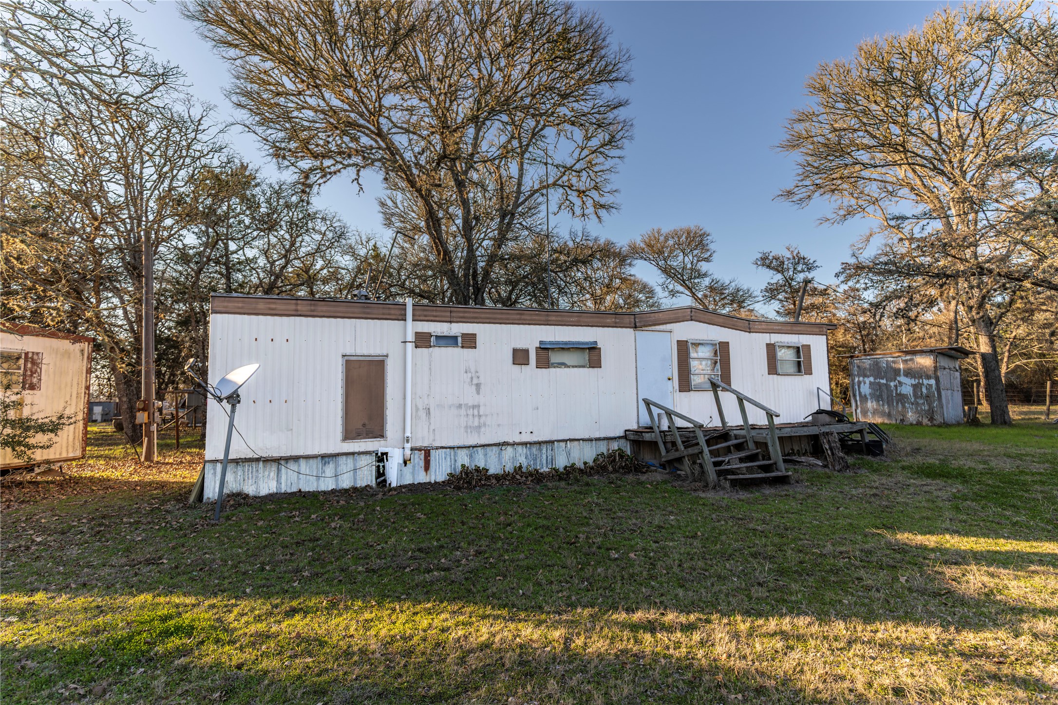 125 Forrest Lane Brenham, TX 77833 - Photo 15 of 21 a view of a house with a yard