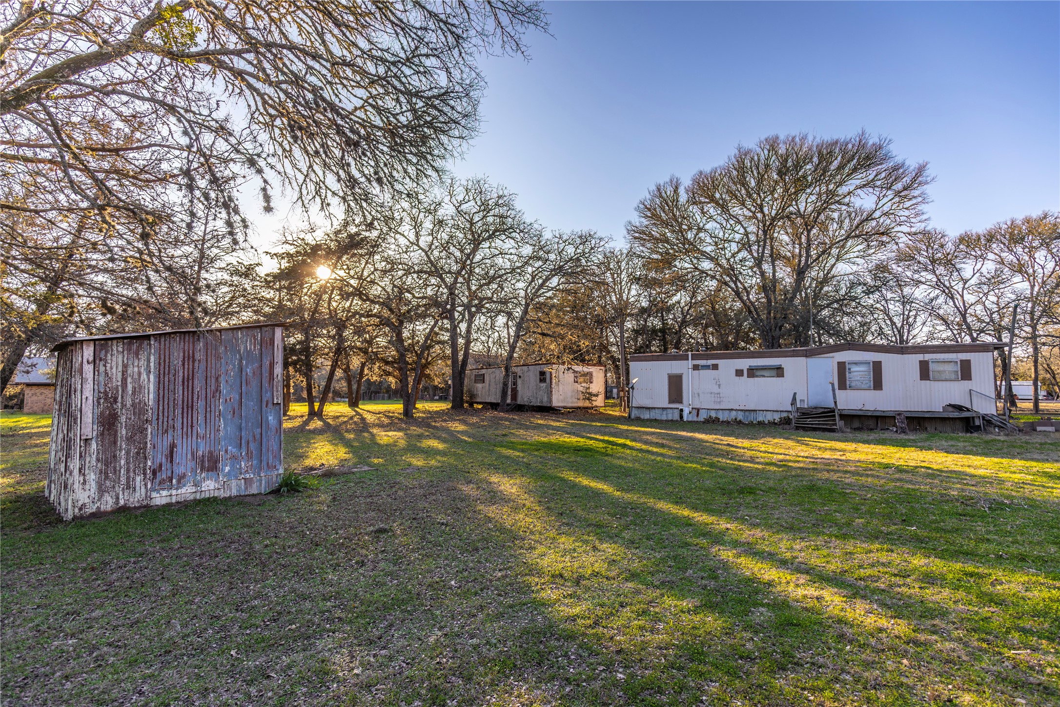 125 Forrest Lane Brenham, TX 77833 - Photo 16 of 21 a swimming pool with wooden fence