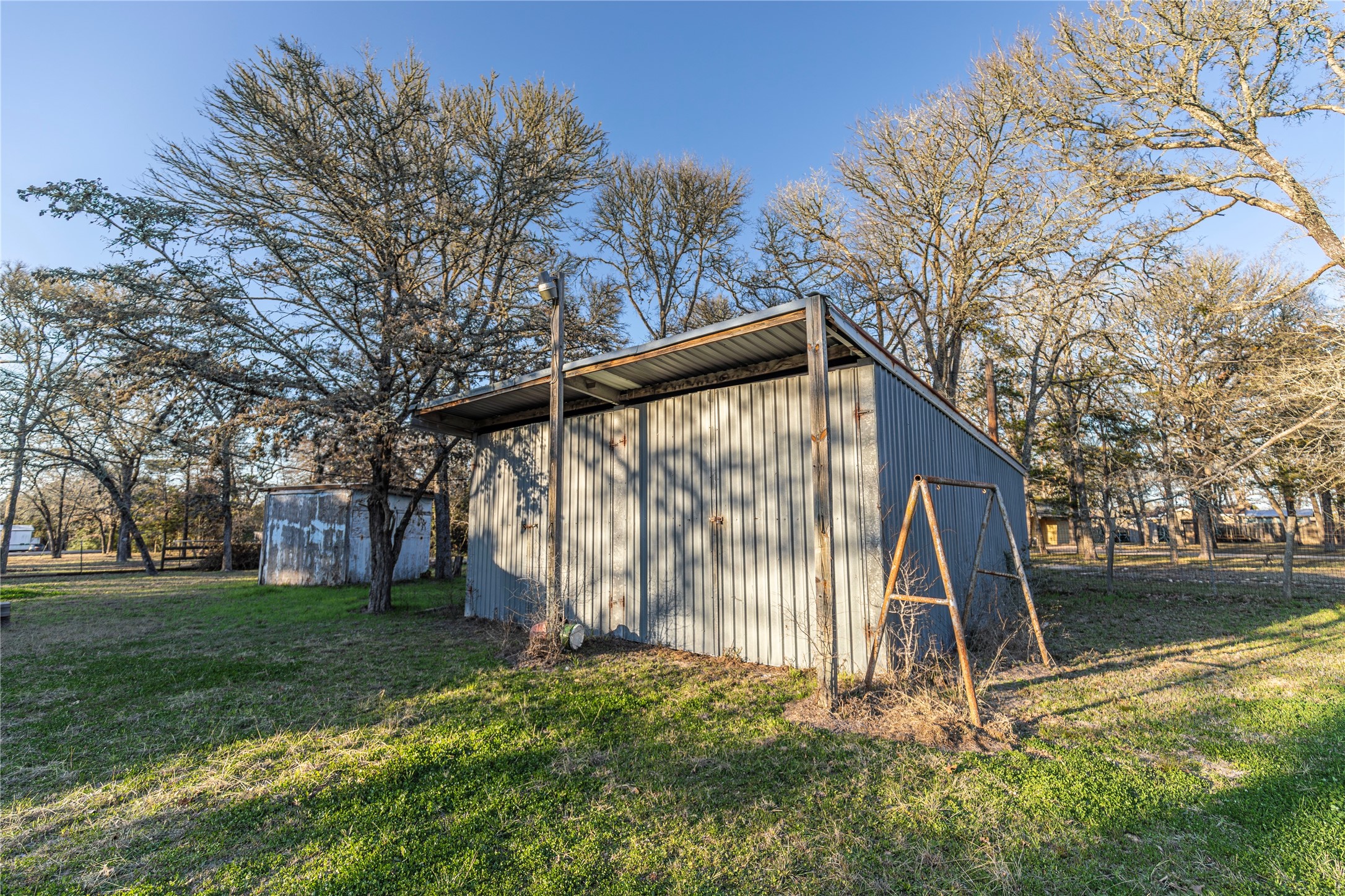 125 Forrest Lane Brenham, TX 77833 - Photo 19 of 21 a view of backyard with tree