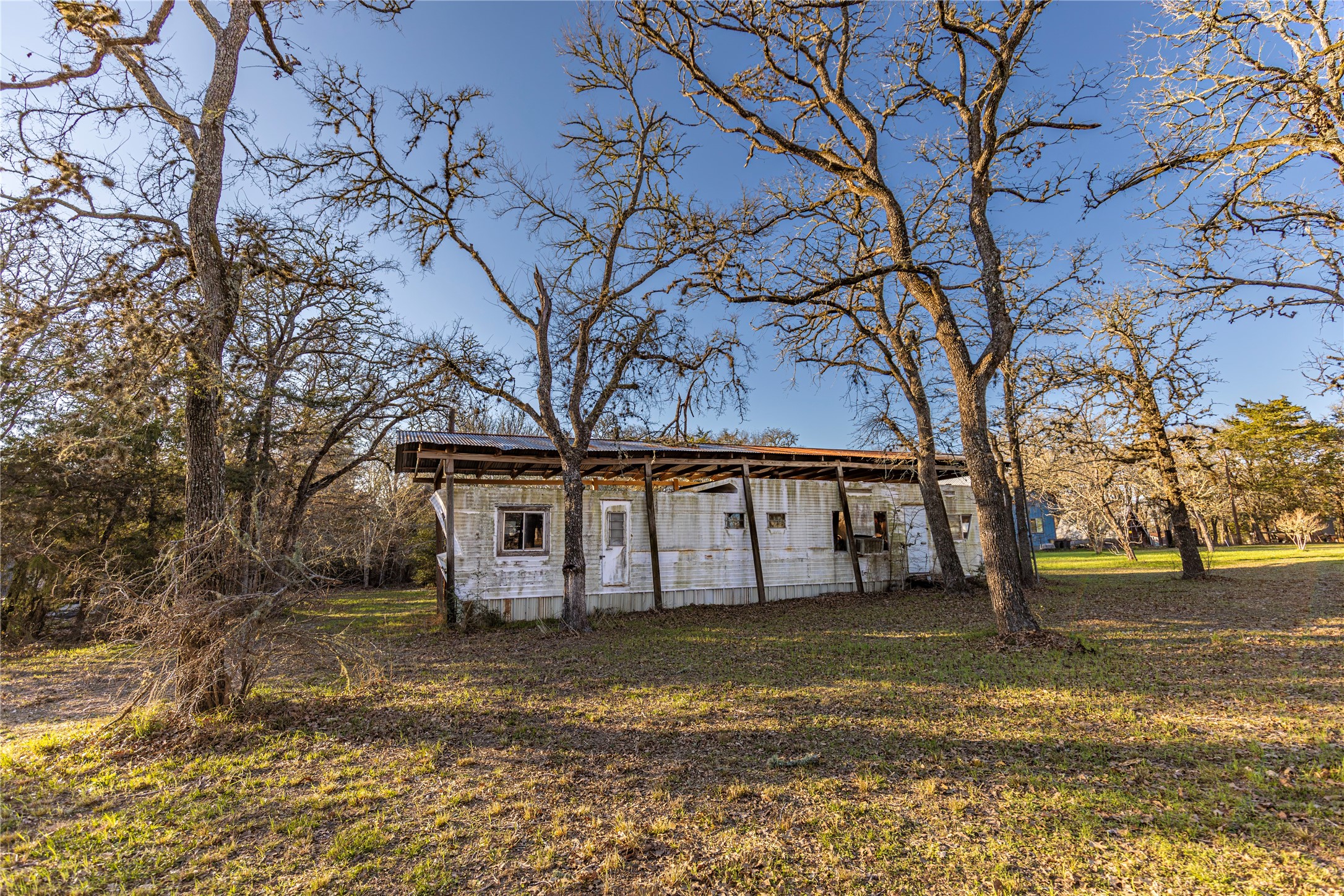 125 Forrest Lane Brenham, TX 77833 - Photo 10 of 21 a view of a house with a yard