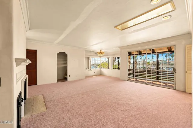 a view of a glass door with a balcony view
