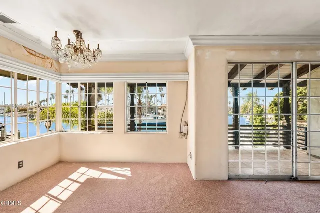 a view of a balcony with wooden floor