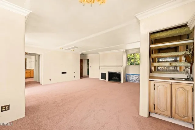 a bathroom with a bathtub and a window