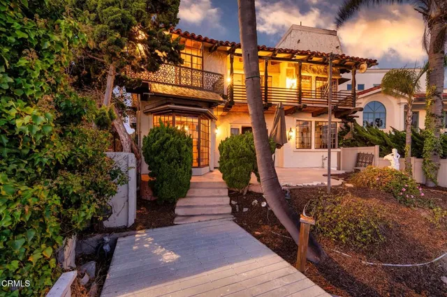 a view of a chairs and tables in the patio