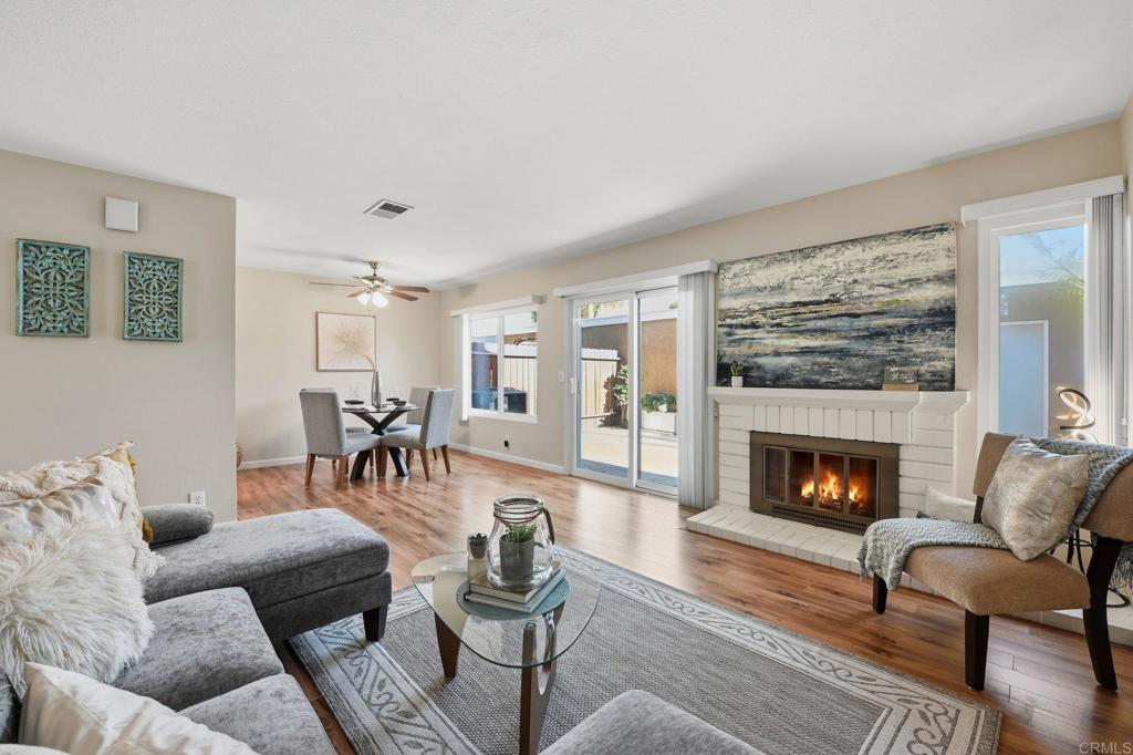 17 Cheyenne, Unit 64 Irvine, CA 92604 - Photo 1 of 33 a living room with furniture and a fireplace