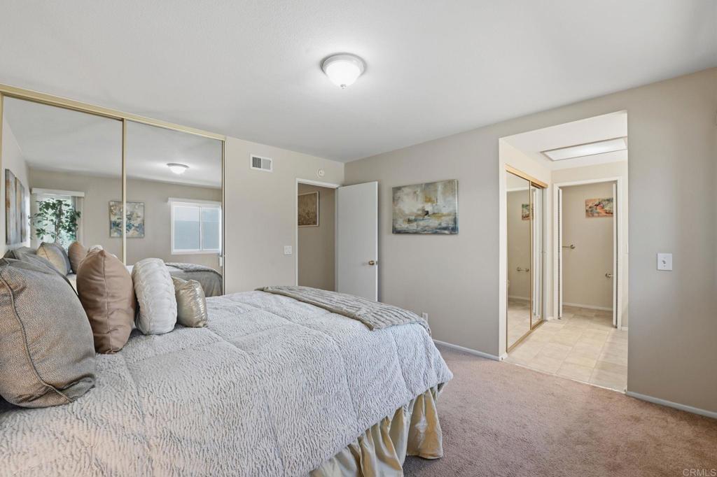 17 Cheyenne, Unit 64 Irvine, CA 92604 - Photo 17 of 33 a bedroom with a bed and a lamp