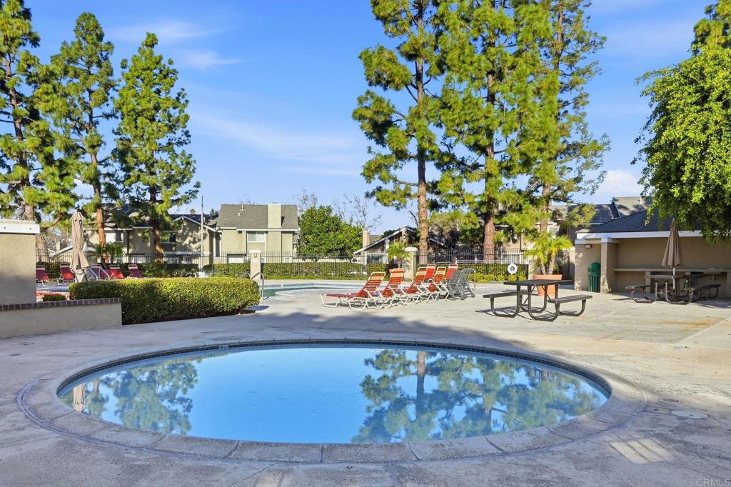 17 Cheyenne, Unit 64 Irvine, CA 92604 - Photo 30 of 33 a view of a swimming pool with a patio