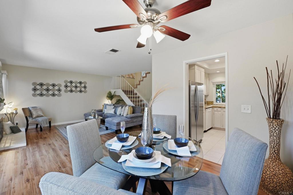 17 Cheyenne, Unit 64 Irvine, CA 92604 - Photo 6 of 33 a view of a dining room with furniture and wooden floor