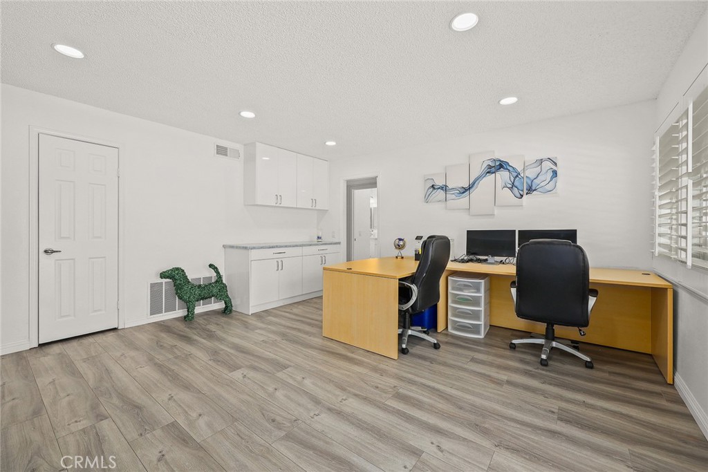 17845 Calle Barcelona Rowland Heights, CA 91748 - Photo 13 of 45 a workspace with furniture and wooden floor