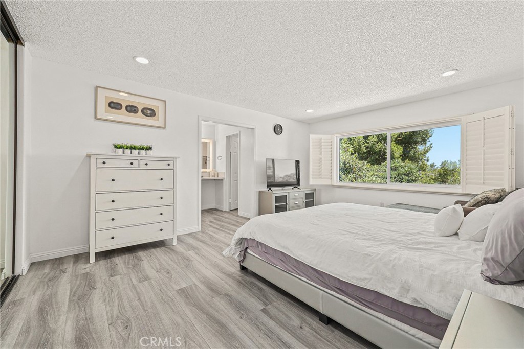 17845 Calle Barcelona Rowland Heights, CA 91748 - Photo 19 of 45 a bedroom with a bed and a dresser