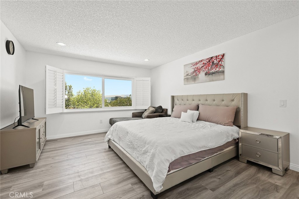 17845 Calle Barcelona Rowland Heights, CA 91748 - Photo 20 of 45 a large bedroom with a bed and a large window