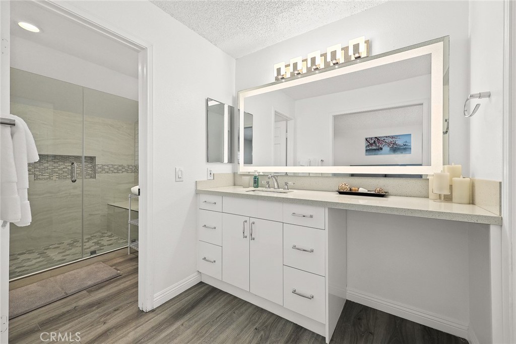 17845 Calle Barcelona Rowland Heights, CA 91748 - Photo 22 of 45 a bathroom with a granite countertop sink mirror and double