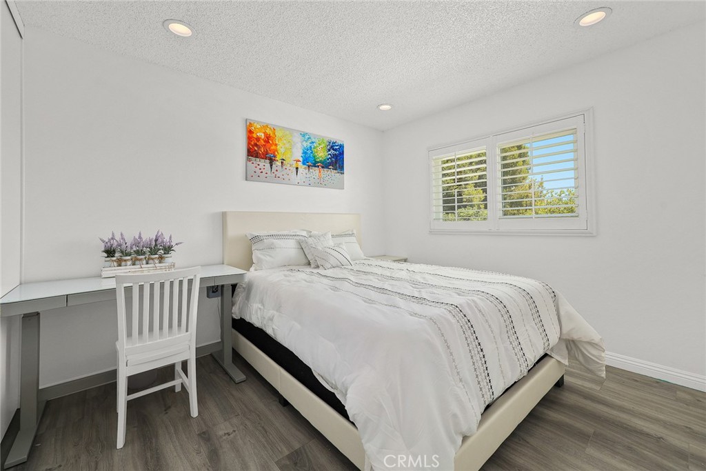 17845 Calle Barcelona Rowland Heights, CA 91748 - Photo 26 of 45 a bedroom with a bed and a table