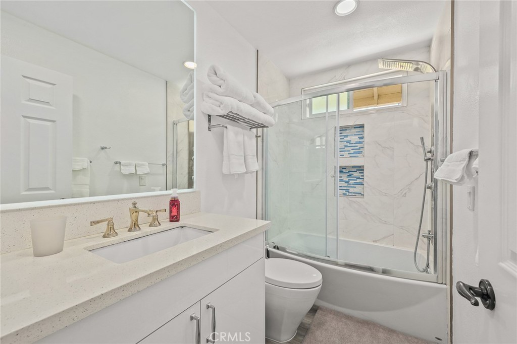 17845 Calle Barcelona Rowland Heights, CA 91748 - Photo 27 of 45 a bathroom with a sink a toilet and shower