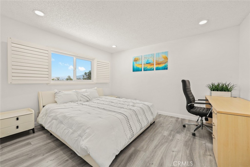 17845 Calle Barcelona Rowland Heights, CA 91748 - Photo 28 of 45 a bedroom with a bed and a desk