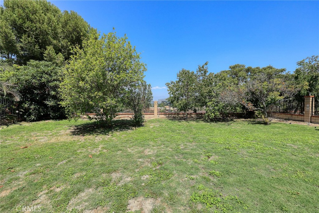 17845 Calle Barcelona Rowland Heights, CA 91748 - Photo 33 of 45 a view of a yard with a house in the background