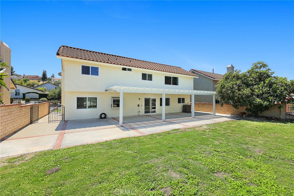 17845 Calle Barcelona Rowland Heights, CA 91748 - Photo 35 of 45 a front view of a house with a yard