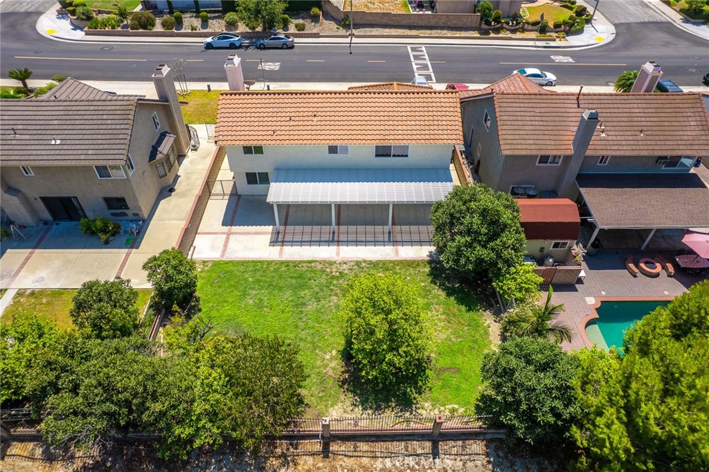 17845 Calle Barcelona Rowland Heights, CA 91748 - Photo 38 of 45 a view of a backyard with plants and a patio