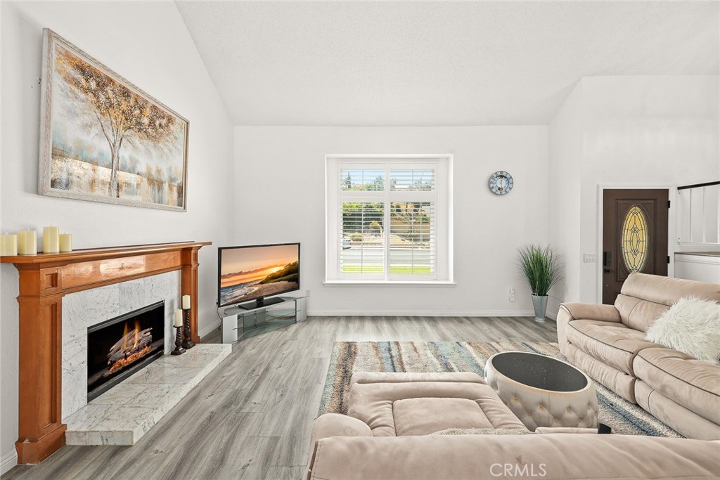 17845 Calle Barcelona Rowland Heights, CA 91748 - Photo 4 of 45 a living room with furniture and a fireplace