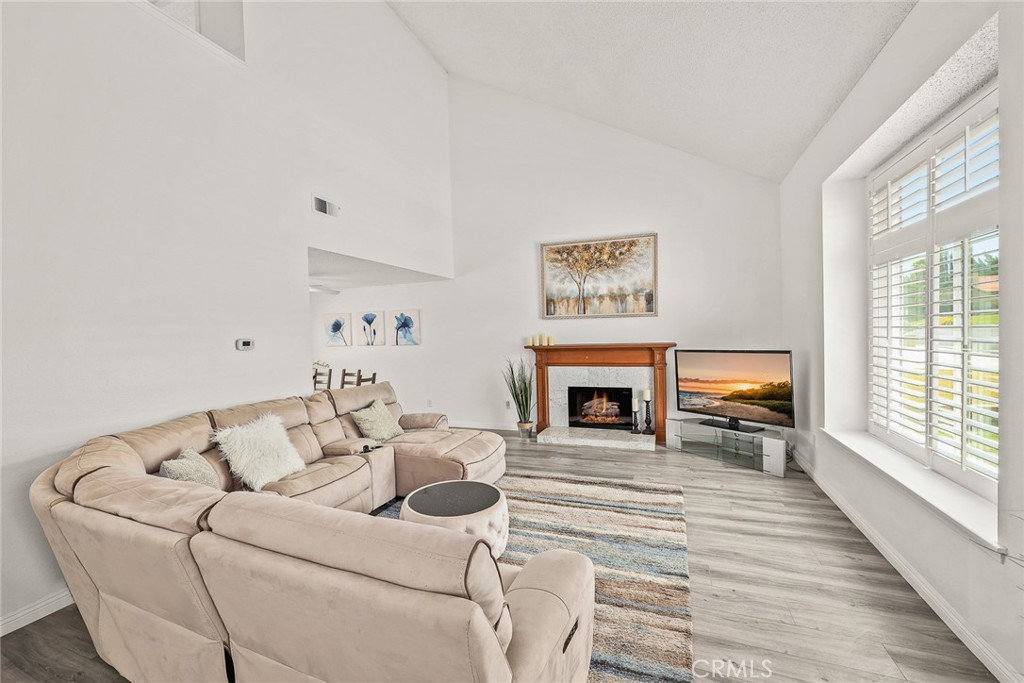 17845 Calle Barcelona Rowland Heights, CA 91748 - Photo 5 of 45 a living room with furniture a fireplace and next to a window