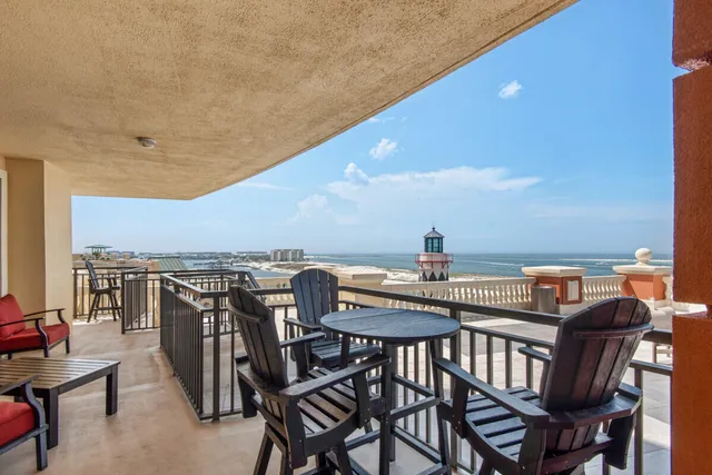 a view of balcony with furniture