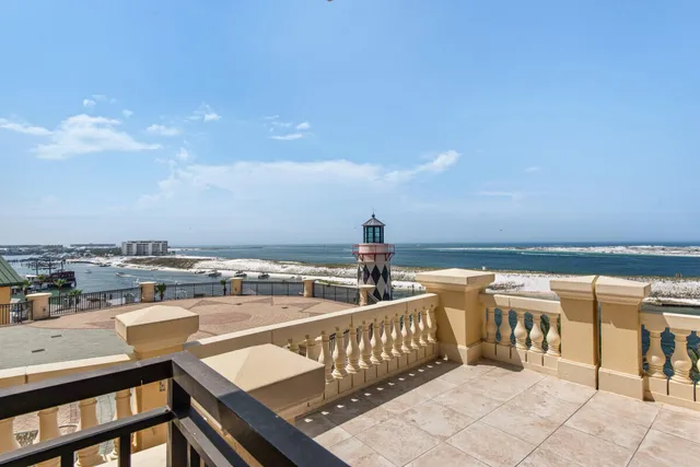 a view of a chairs and table in patio