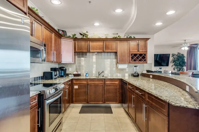 a bedroom with a bed and ceiling fan