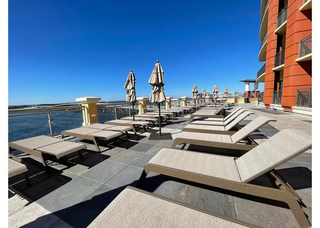 an aerial view of a house with outdoor space