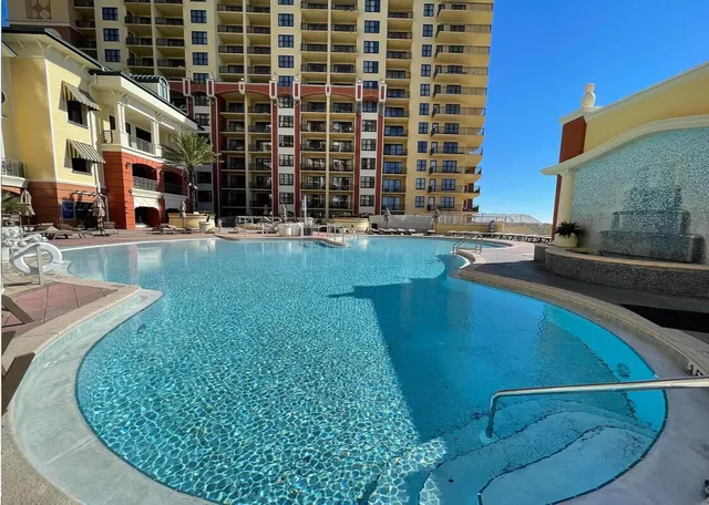 a view of a balcony with chairs