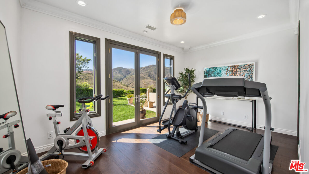 27311 Winding Way Malibu, CA 90265 - Photo 49 of 73 a view of a room with gym equipment