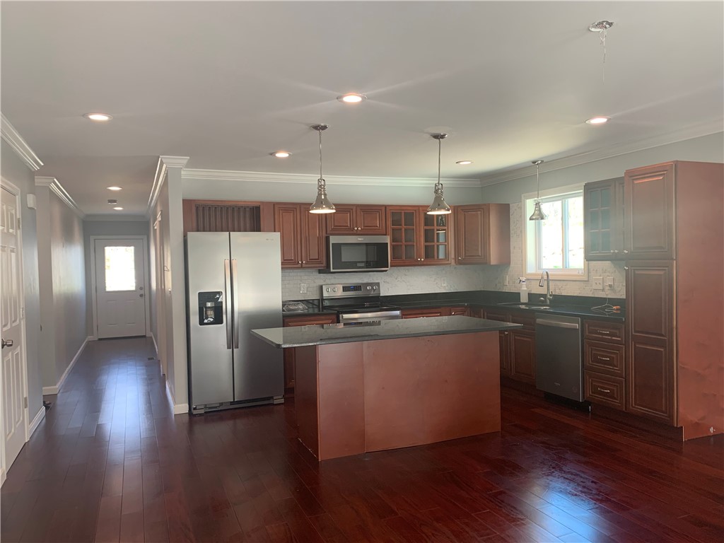 1520 Chopmist Hill Road, Unit 10 Scituate, RI 02857 - Photo 4 of 9 Kitchen with Granite counters, backsplash & Stainless-Steel Appliances