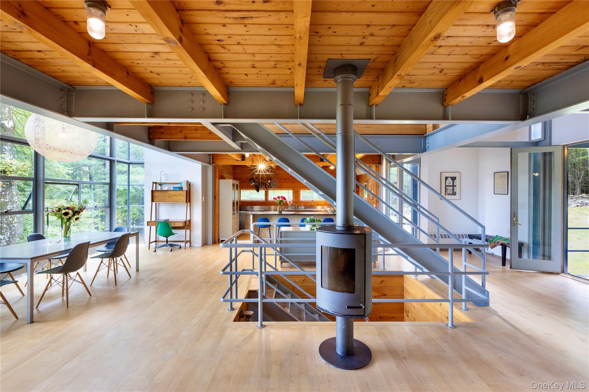 39 Hornbeck Road Accord, NY 12404 - Photo 10 of 24 Staircase featuring wood finished floors, expansive windows, a wood ceiling with exposed beams, and a chandelier