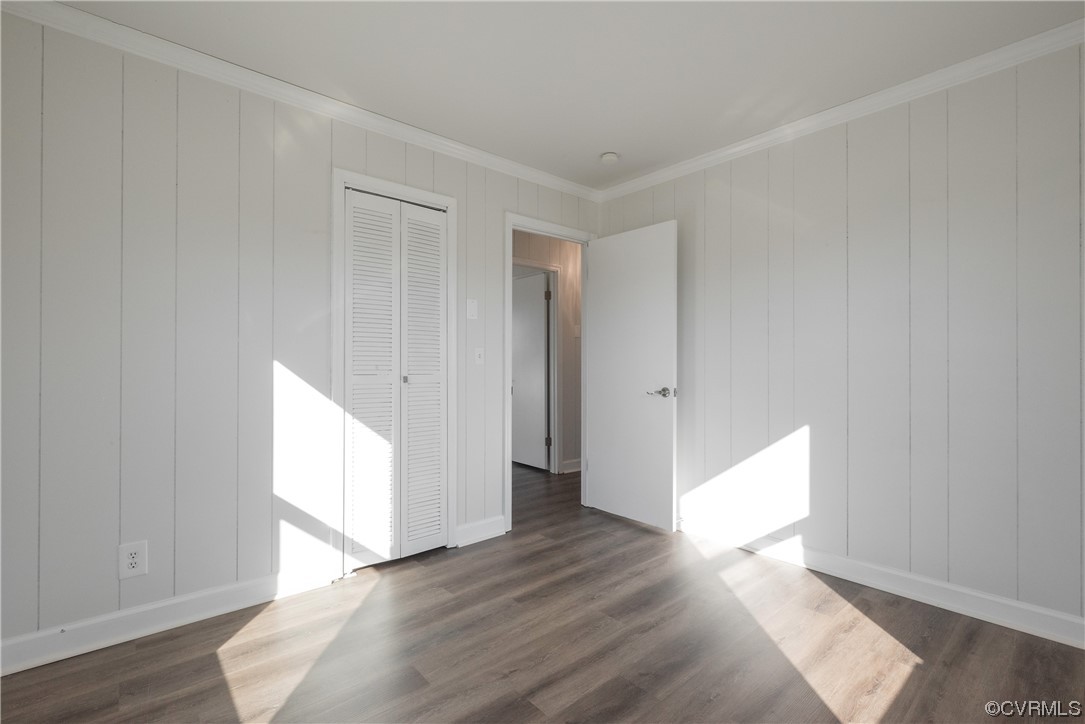 320 Courtney Road Lancaster, VA 22503 - Photo 19 of 43 a view of an empty room with wooden floor