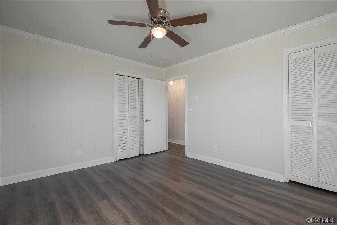 320 Courtney Road Lancaster, VA 22503 - Photo 21 of 43 an empty room with wooden floor ceiling fan and window