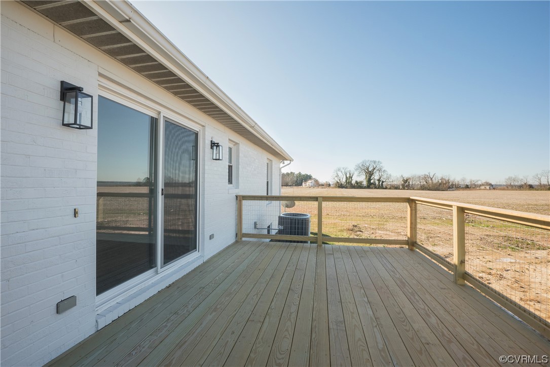 320 Courtney Road Lancaster, VA 22503 - Photo 29 of 43 a view of a balcony with wooden floor
