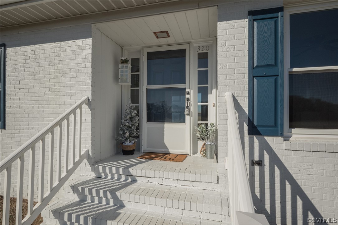 320 Courtney Road Lancaster, VA 22503 - Photo 4 of 43 a view of entryway with a front door