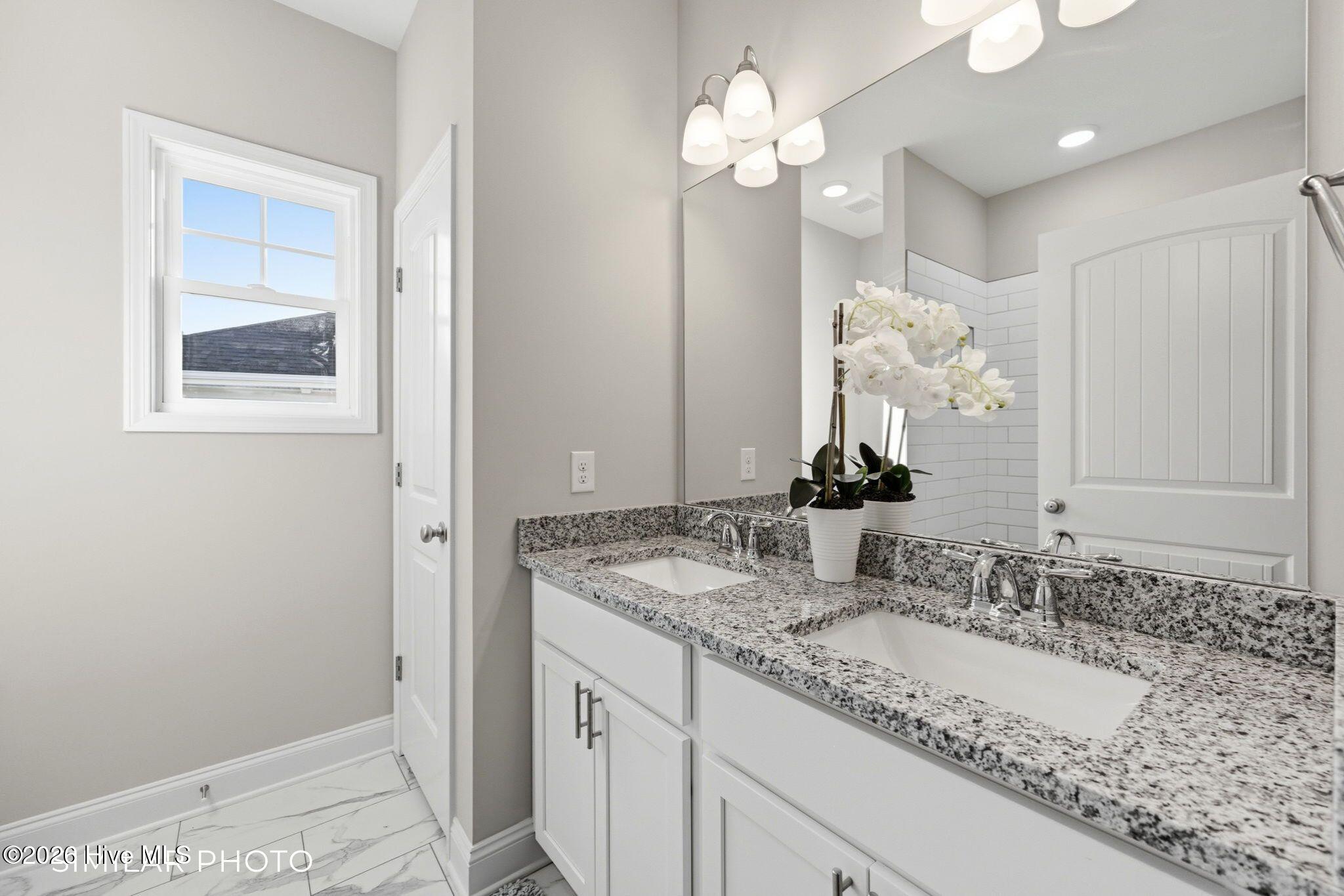 207 Holly Sands Loop Sneads Ferry, NC 28460 - Photo 24 of 45 Similar Photo - Primary Bathroom