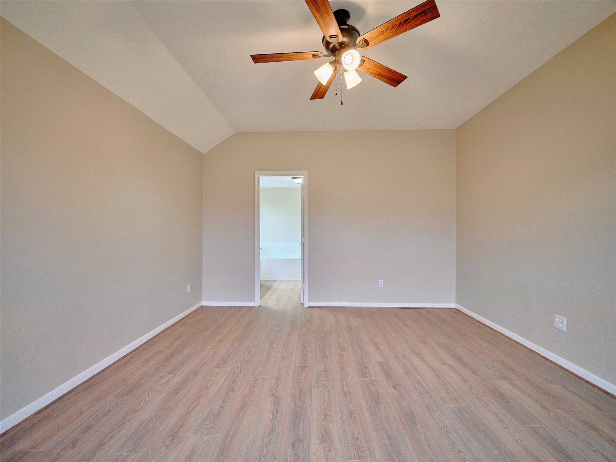 4801 East Columbary Drive Rosenberg, TX 77471 - Photo 20 of 50 wooden floor in an empty room with a window