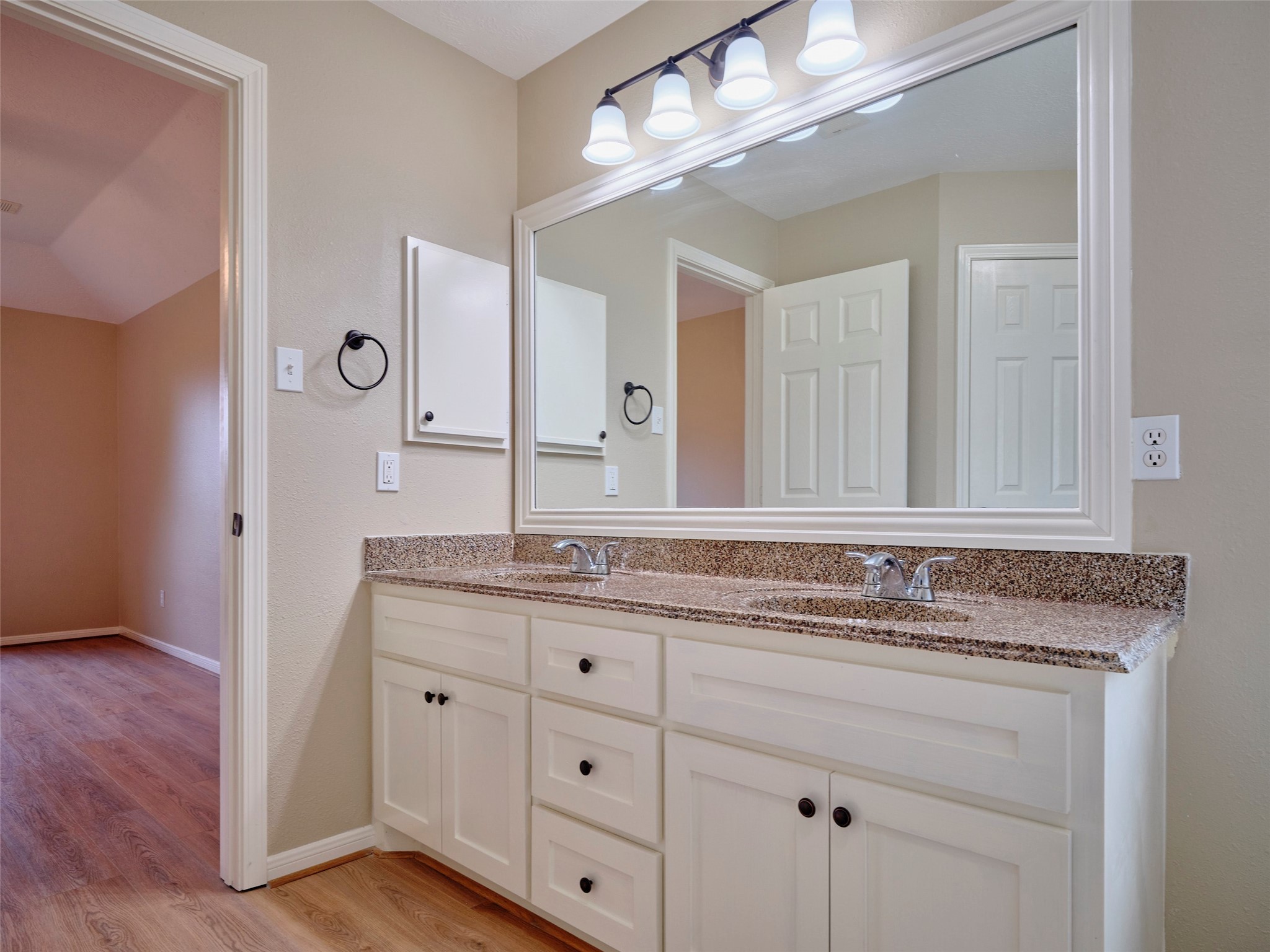 4801 East Columbary Drive Rosenberg, TX 77471 - Photo 25 of 50 a bathroom with a granite countertop sink and a mirror