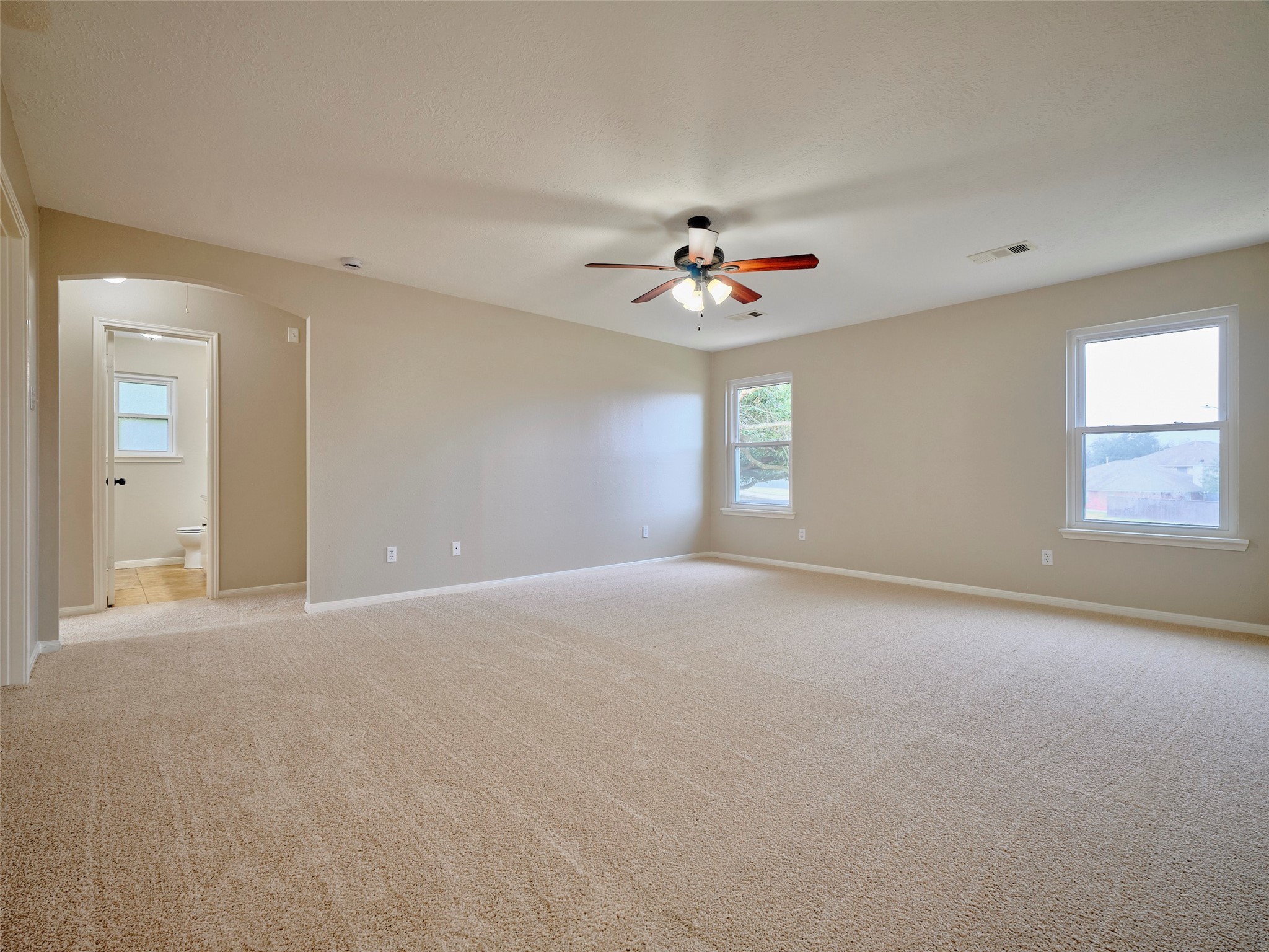 4801 East Columbary Drive Rosenberg, TX 77471 - Photo 30 of 50 a view of an empty room with a window