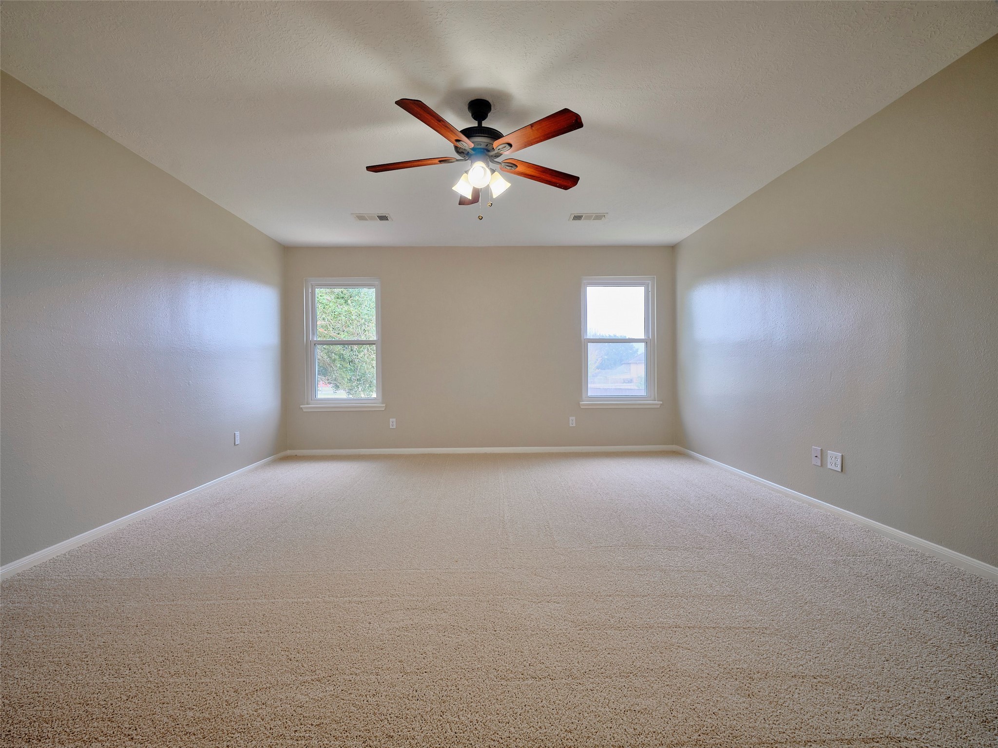 4801 East Columbary Drive Rosenberg, TX 77471 - Photo 31 of 50 a view of an empty room with a window