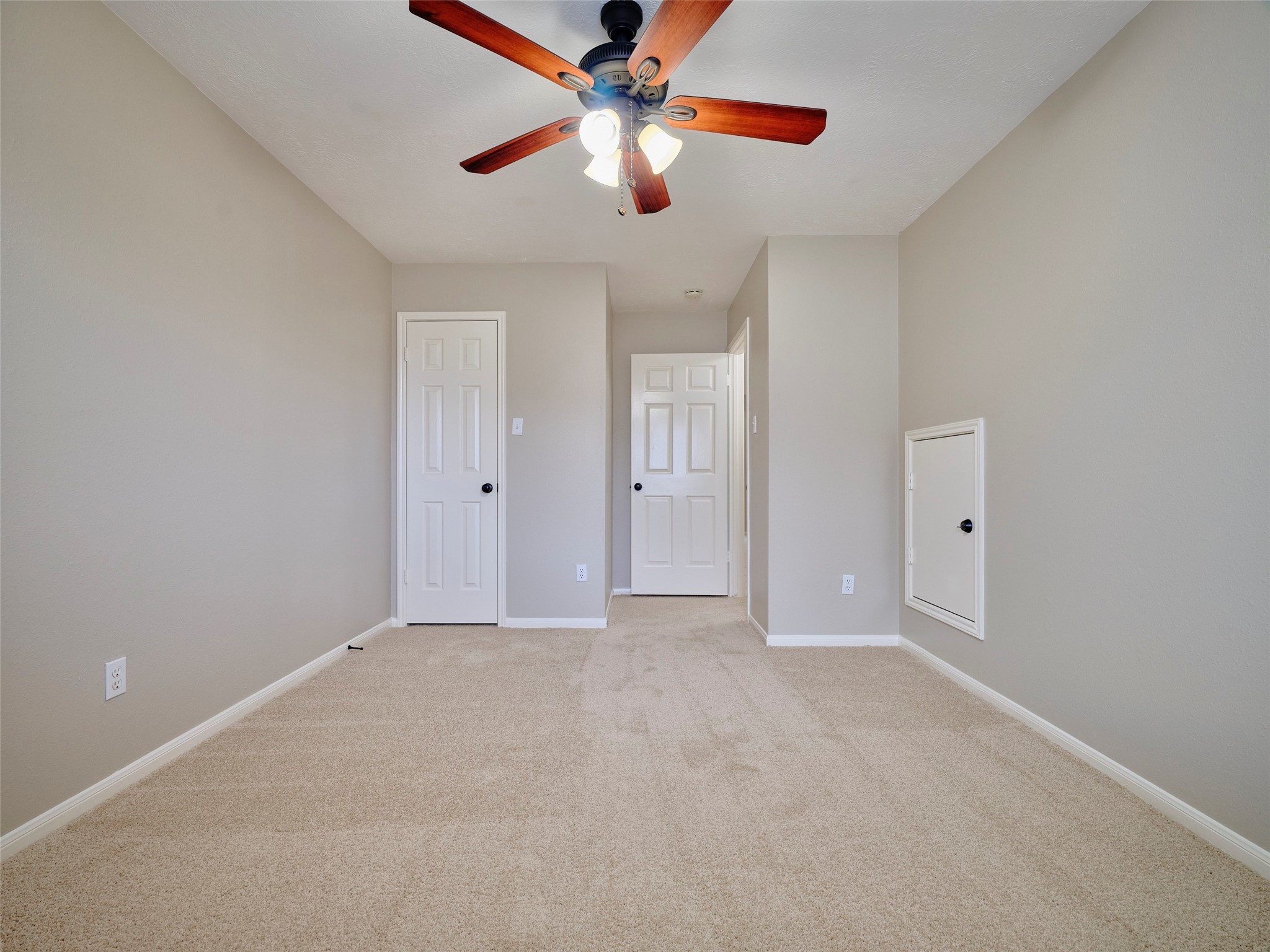 4801 East Columbary Drive Rosenberg, TX 77471 - Photo 35 of 50 a view of an empty room and chandelier fan