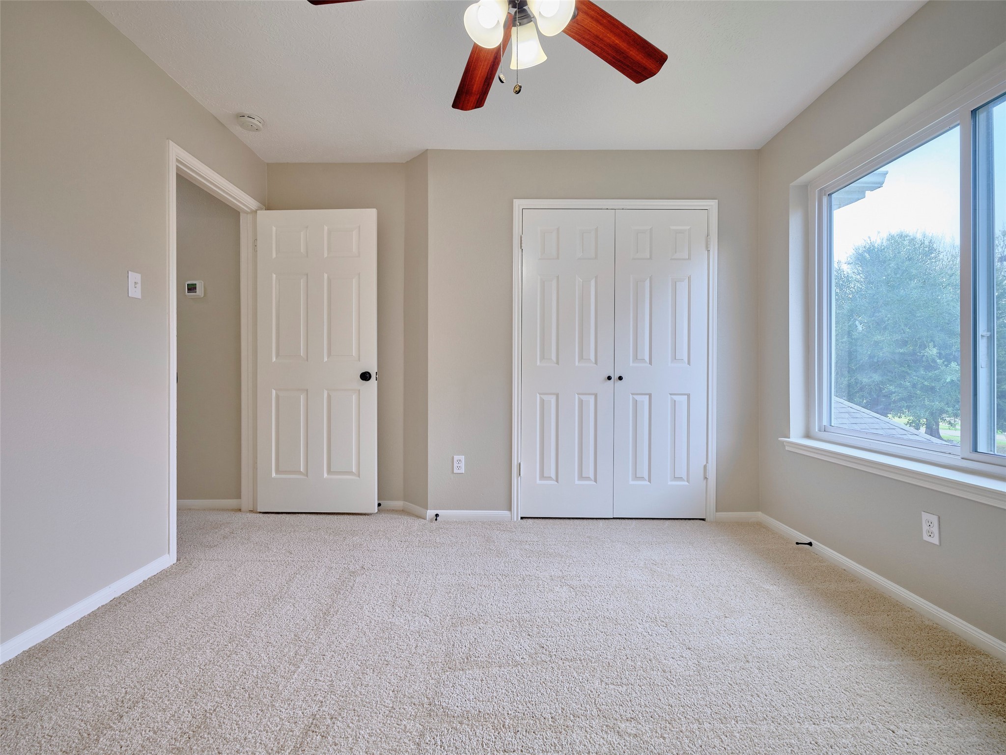 4801 East Columbary Drive Rosenberg, TX 77471 - Photo 39 of 50 a view of an empty room with a window