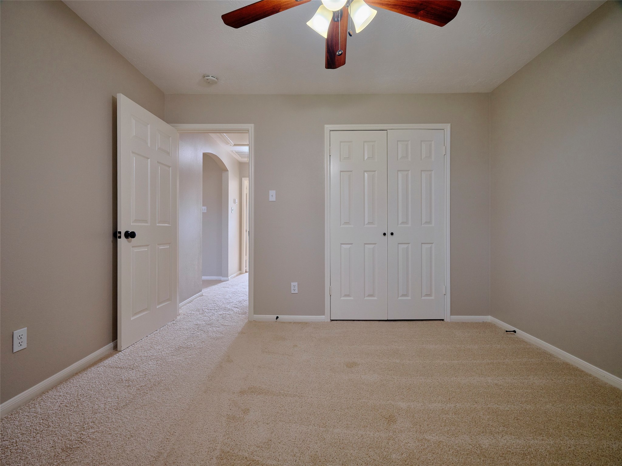 4801 East Columbary Drive Rosenberg, TX 77471 - Photo 43 of 50 an empty room with chandelier fan