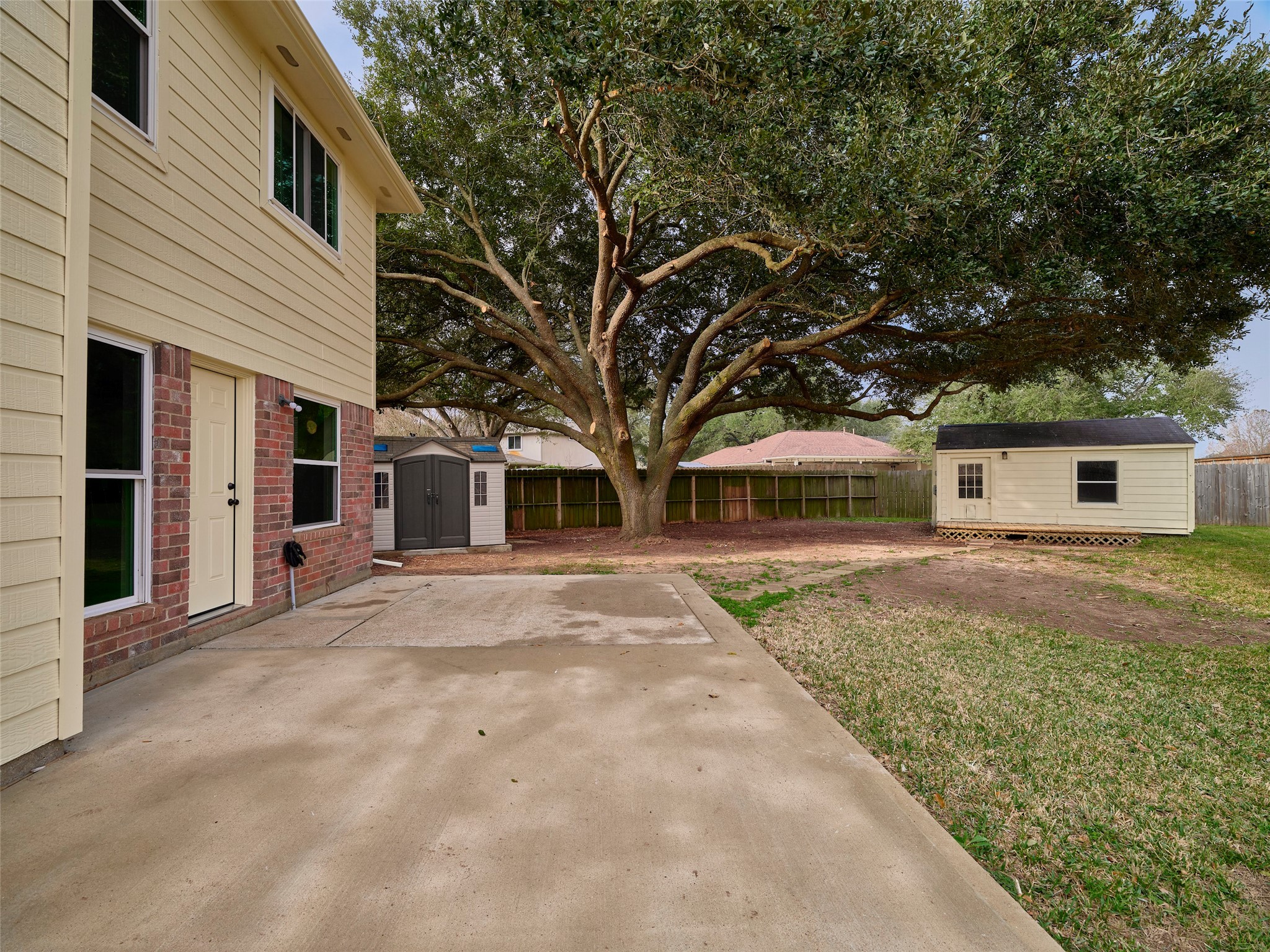4801 East Columbary Drive Rosenberg, TX 77471 - Photo 45 of 50 a front view of a house with a garden