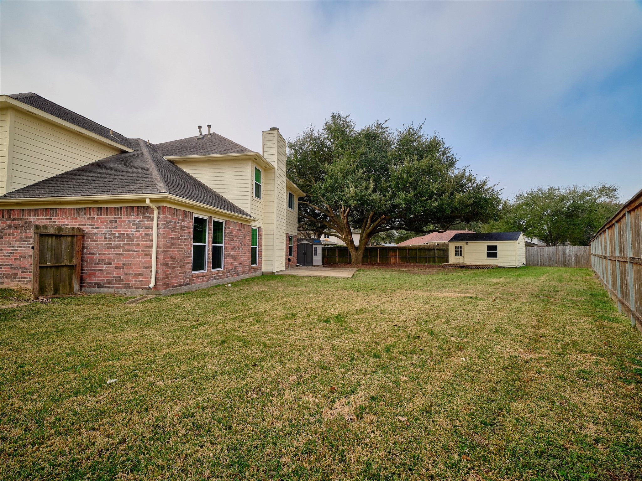 4801 East Columbary Drive Rosenberg, TX 77471 - Photo 46 of 50 a front view of a house with a garden